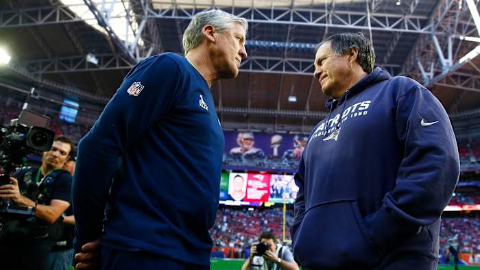 Pete Carroll and Bill Belichick speak before Super Bowl XLIX